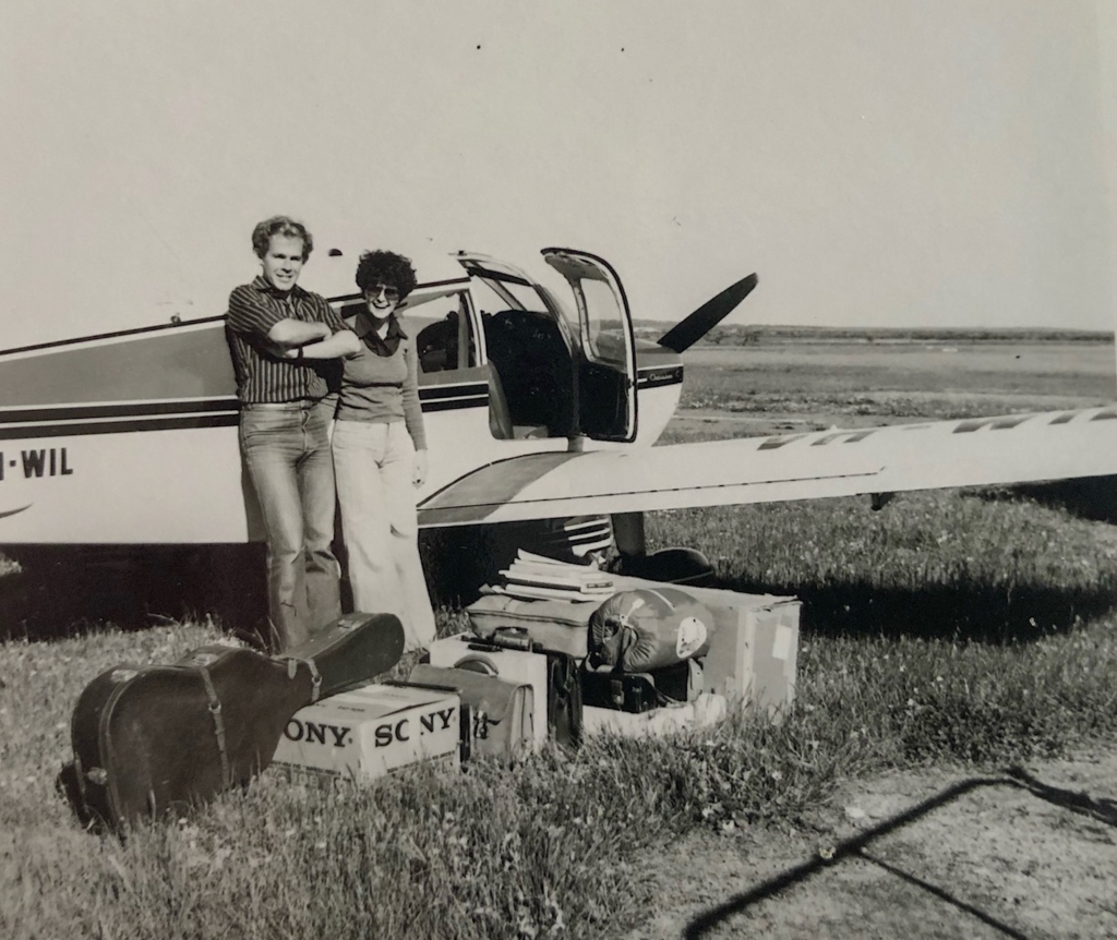 Pilot and passenger and luggage besdie Cherokee 180