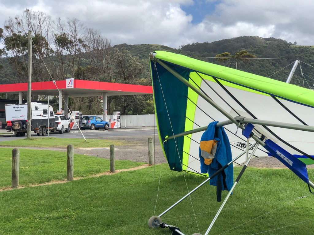 Hang glider ready to be packed up near service station in Apollo Bay